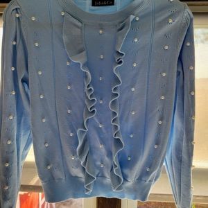 Pearl embellished ruffle sweater in Baby Blue